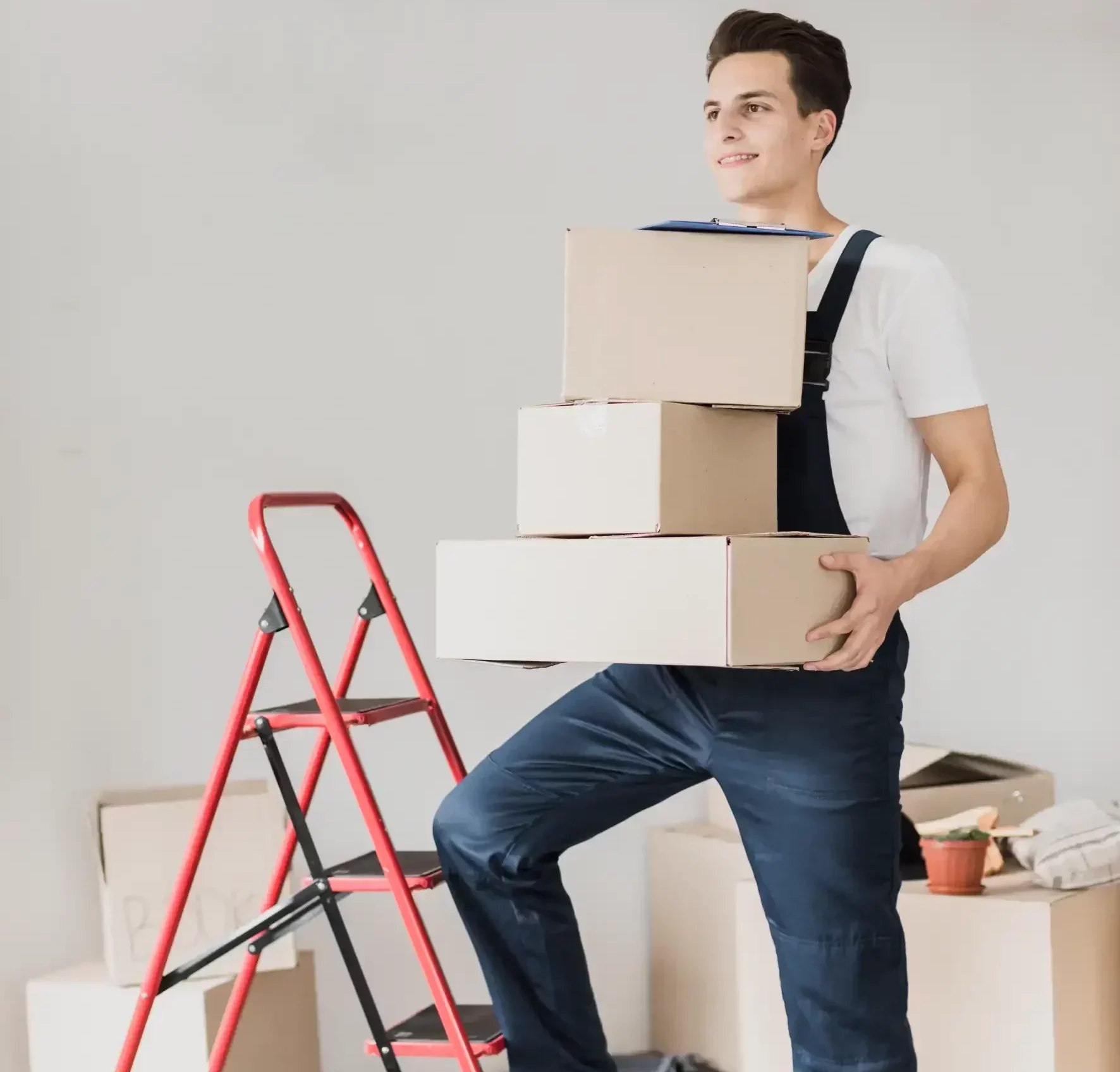 young man holding boxes for moving out of the hosue